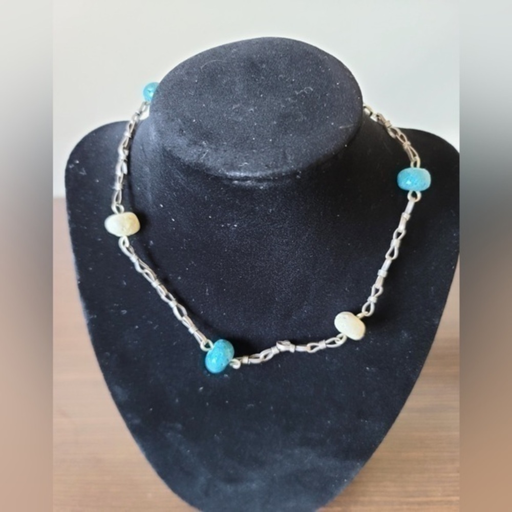 Silver tone with white and turquoise colored beads necklace.